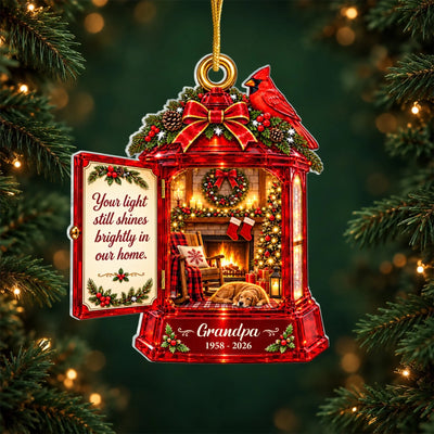 Your light Still Shines Brightly In Our Home - Personalized Acrylic Ornament, Cozy Fireplace Memorial Lantern Ornament
