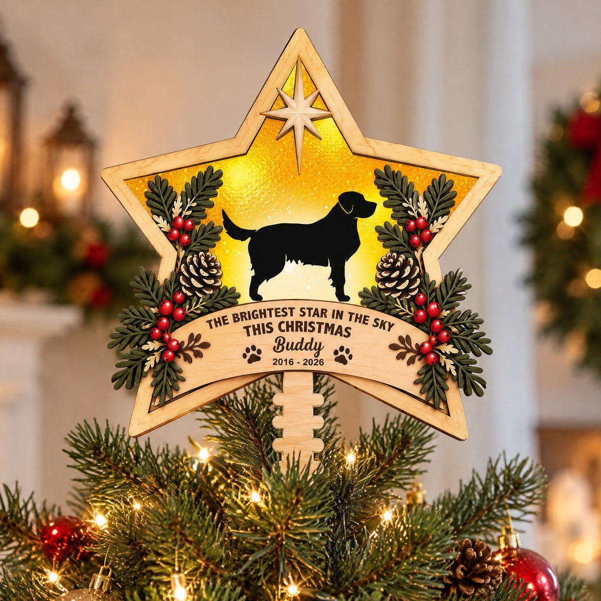 Personalized Brightest Star Christmas Tree Topper close view on tree branches with warm string lights